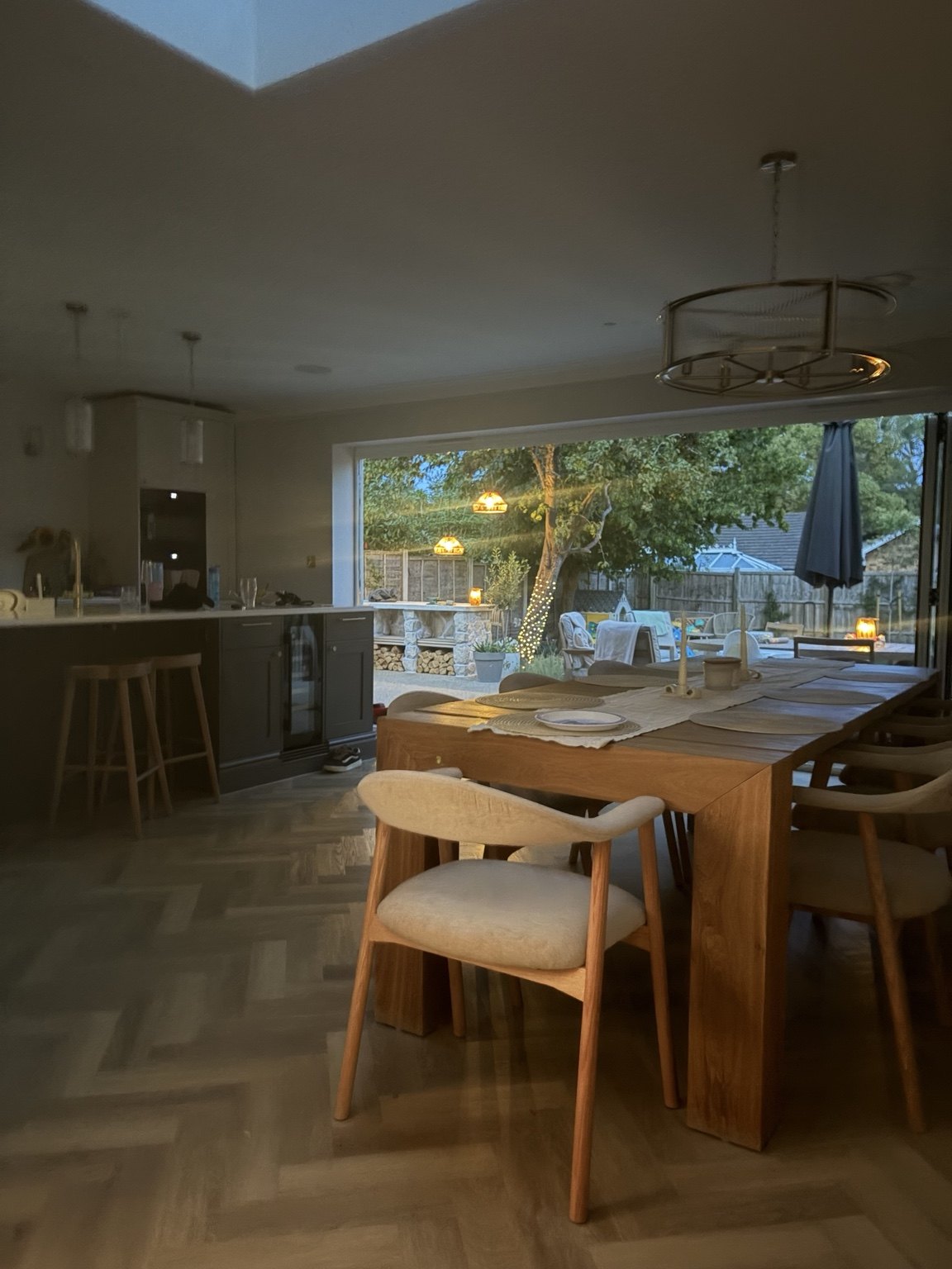 Open-plan dining room overlooking outdoor entertaining space